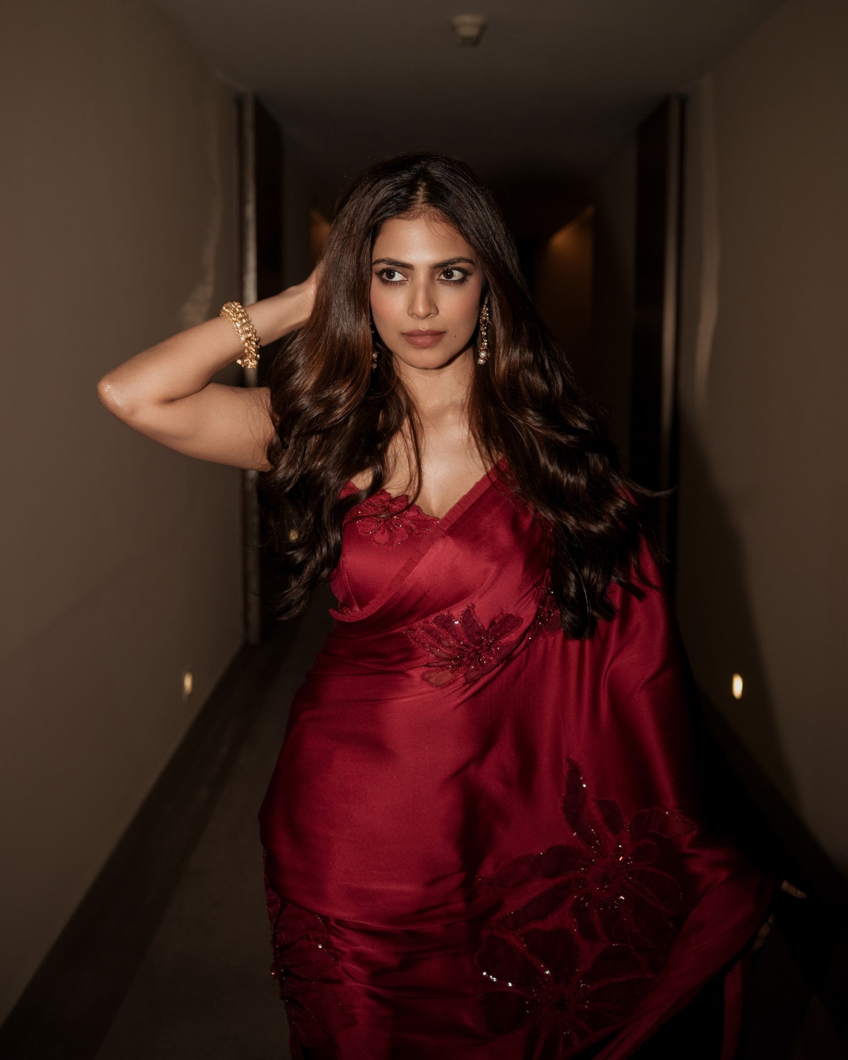 Malavika Mohanan In Strawberry Red Satin Saree