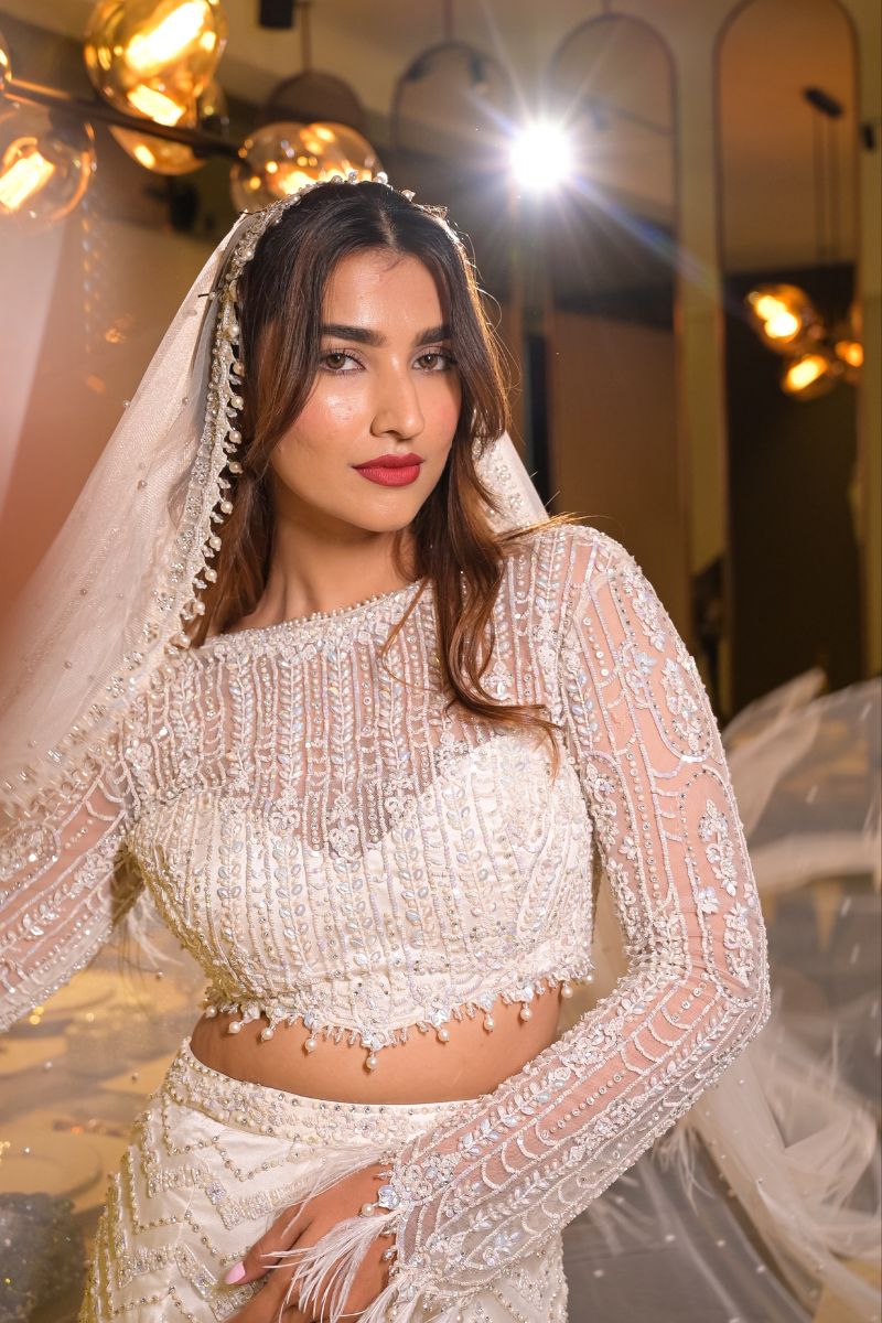 Kinjal Banushlai in Ivory Skirt With Blouse And Veil