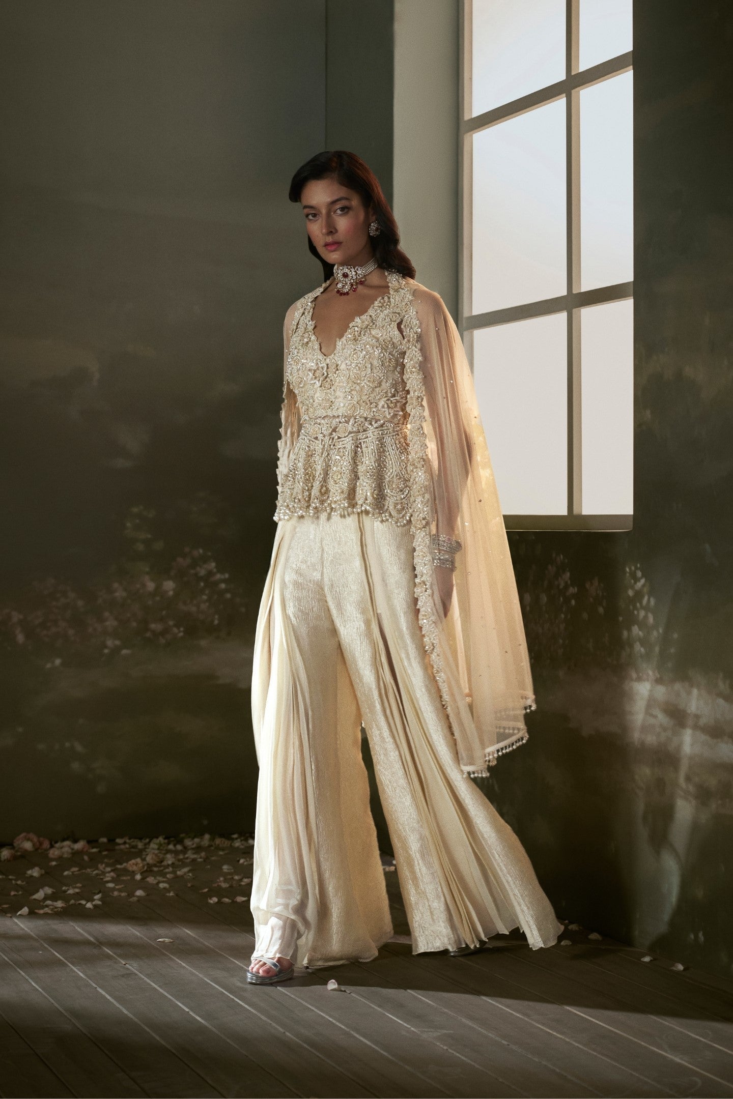 Deeksha Khurana In Cream peplum top and sharara set