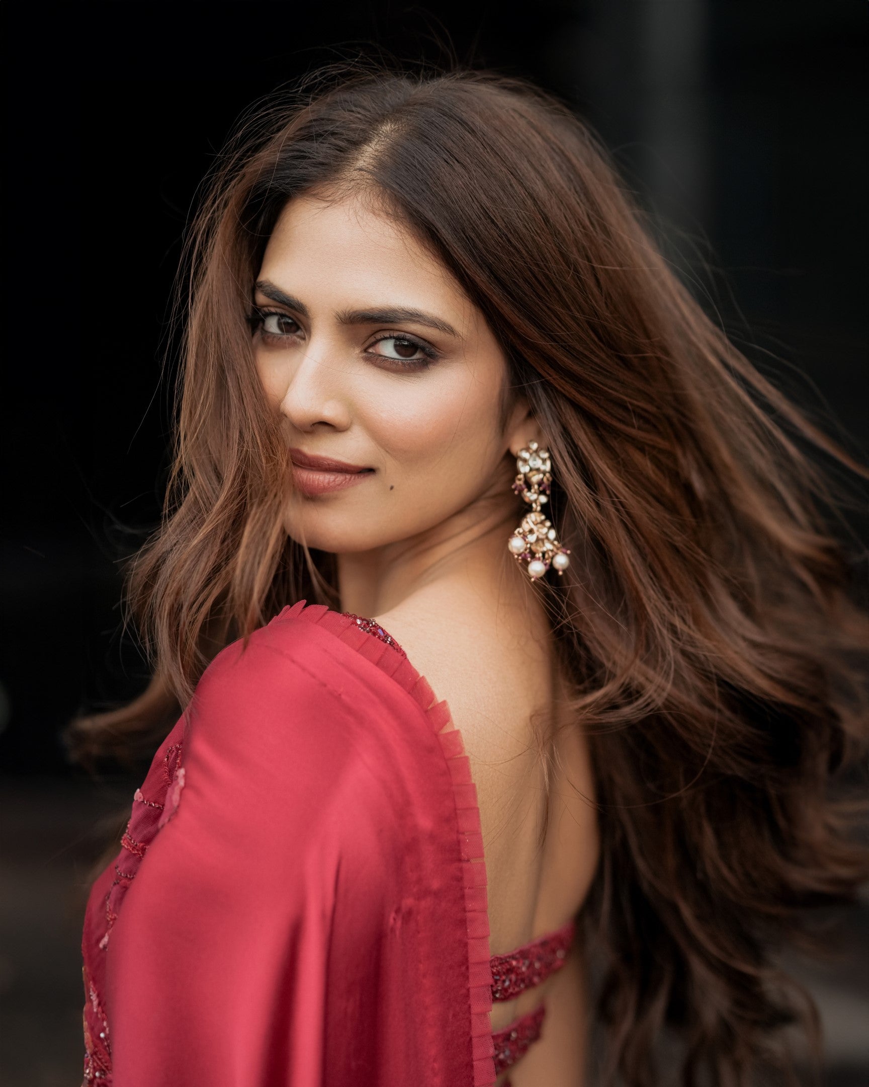 Malavika Mohanan In Strawberry Red Satin Saree