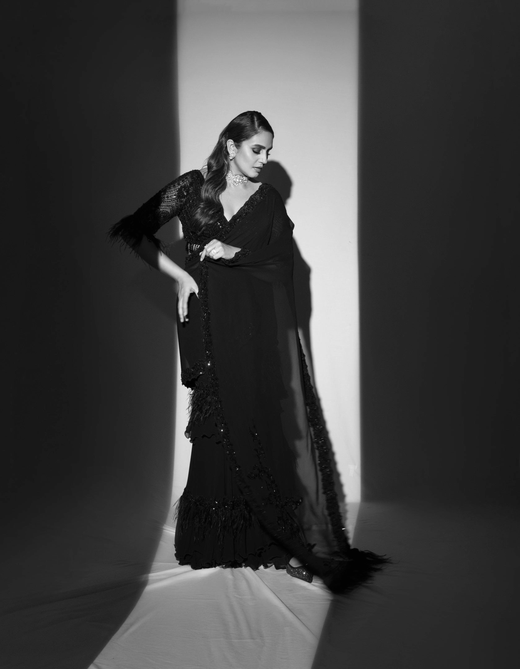 Huma Qureshi In Black Georgette Draped Saree
