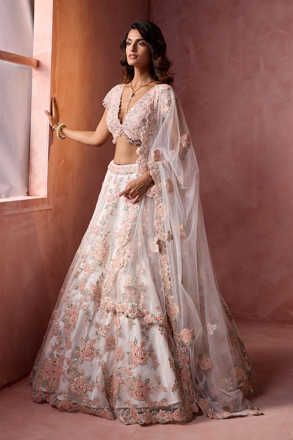 White Net With Leather Applique Lehenga Set