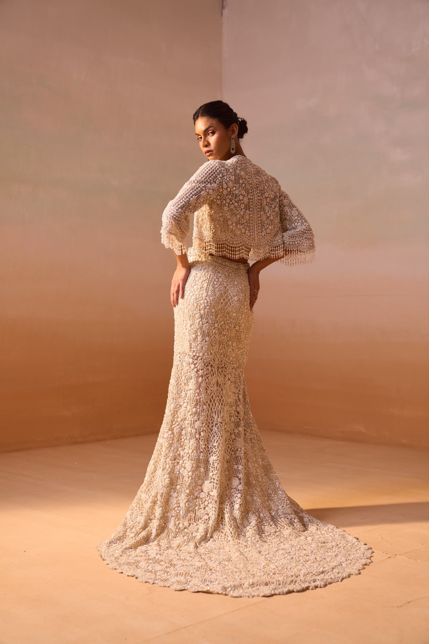 Mallika singhania In IVORY TRAIL SKIRT WITH PLEATED CROPTOP AND VEIL