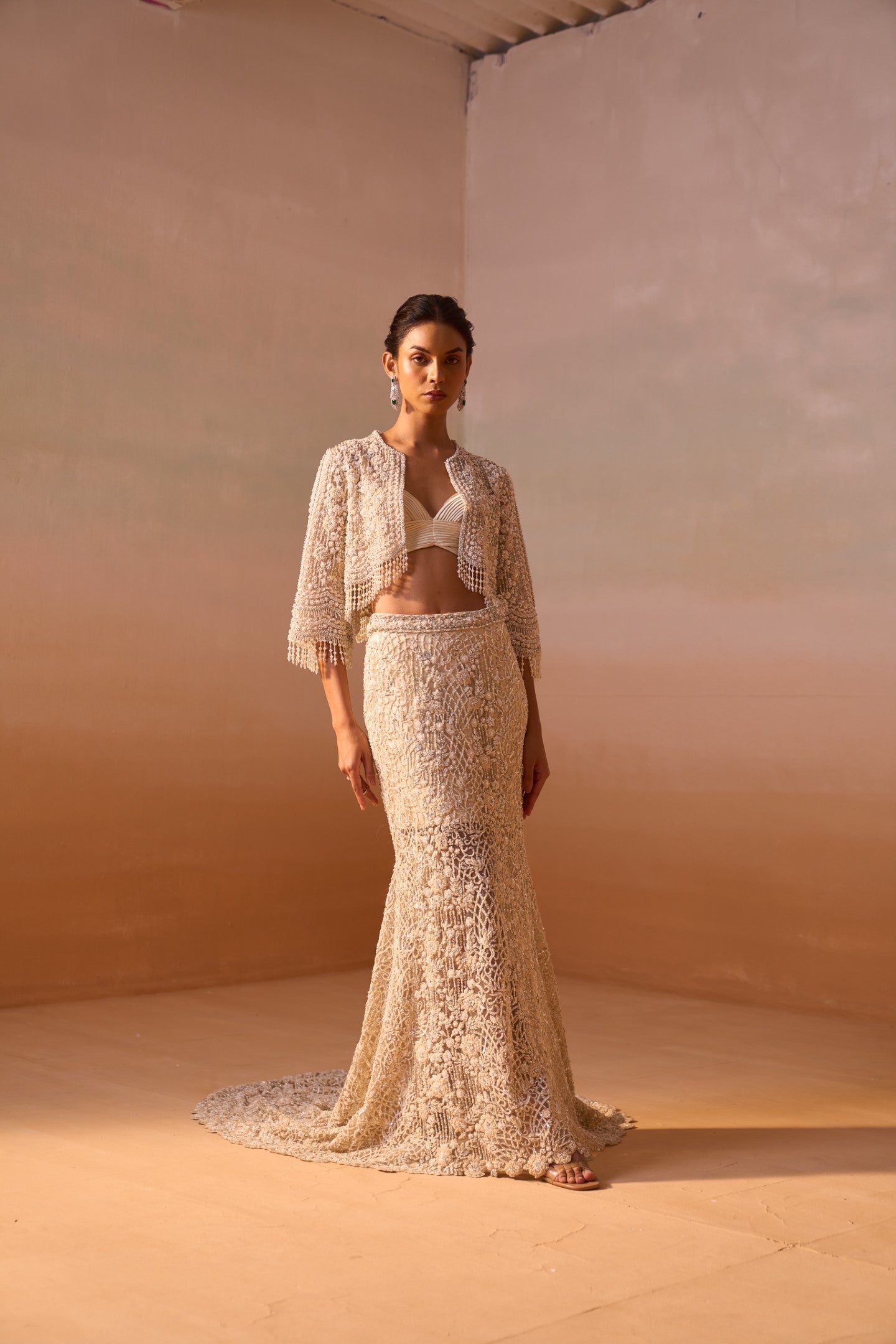 Mallika singhania In IVORY TRAIL SKIRT WITH PLEATED CROPTOP AND VEIL