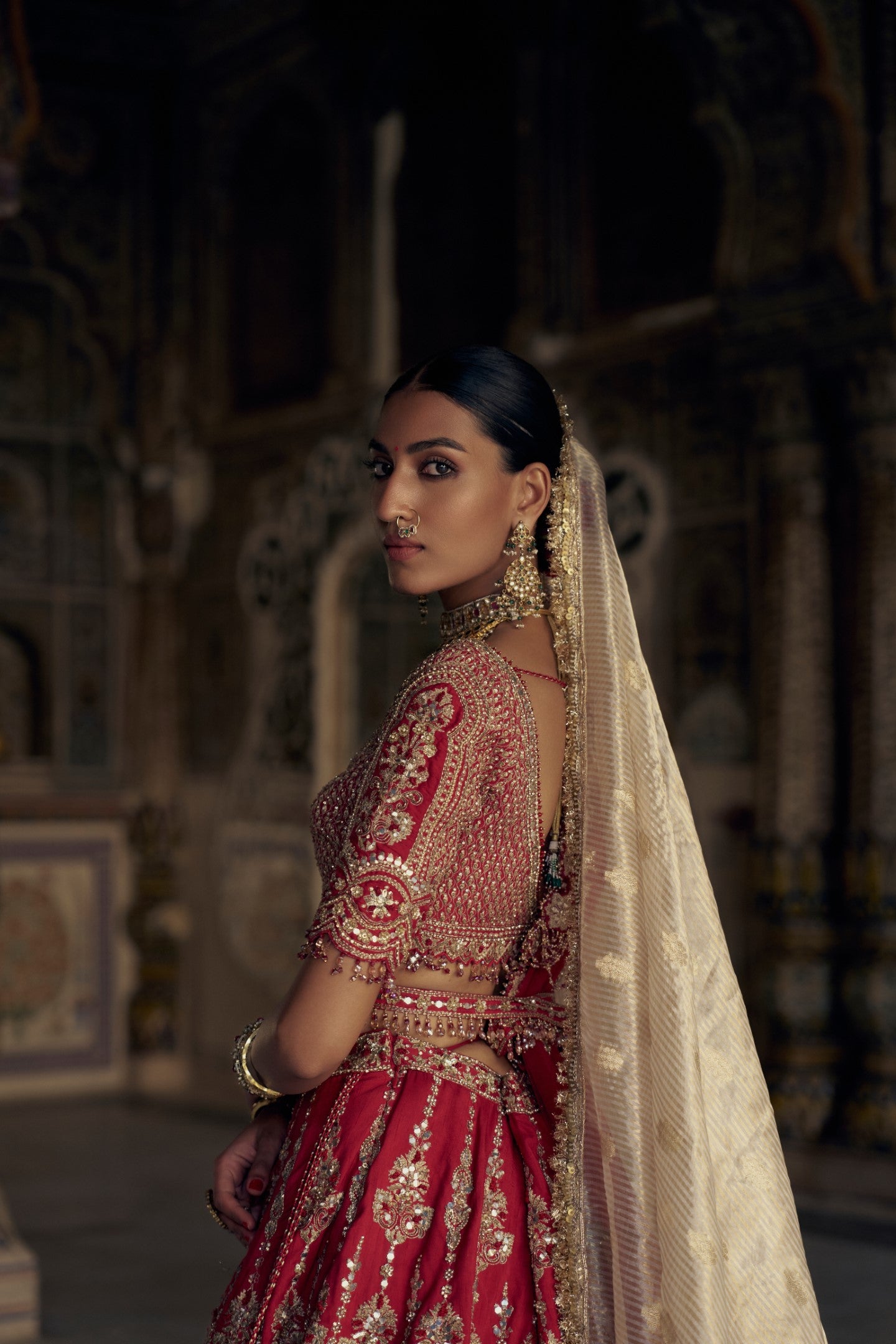 BLOOD RED SILK LEHENGA CHOLI SET WITH A WORKED TULLE DUPATTA