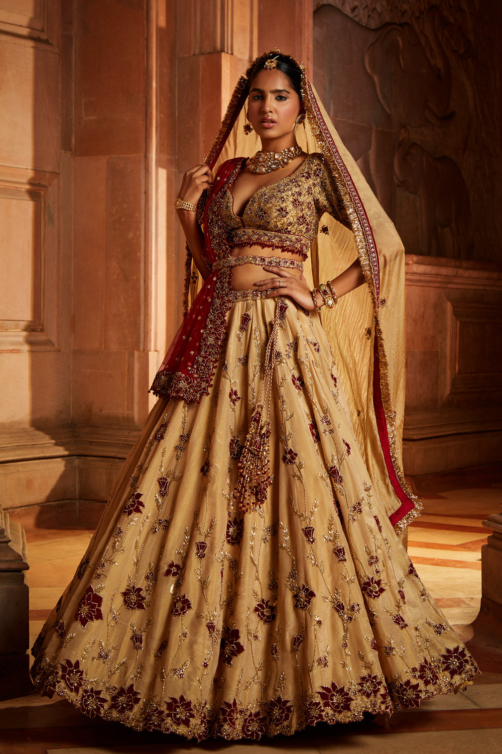 Gold Tissue Lehenga Choli and Belt with contrasting Red Tulle Dupatta and Optional Gold Tissue Second Dupatta