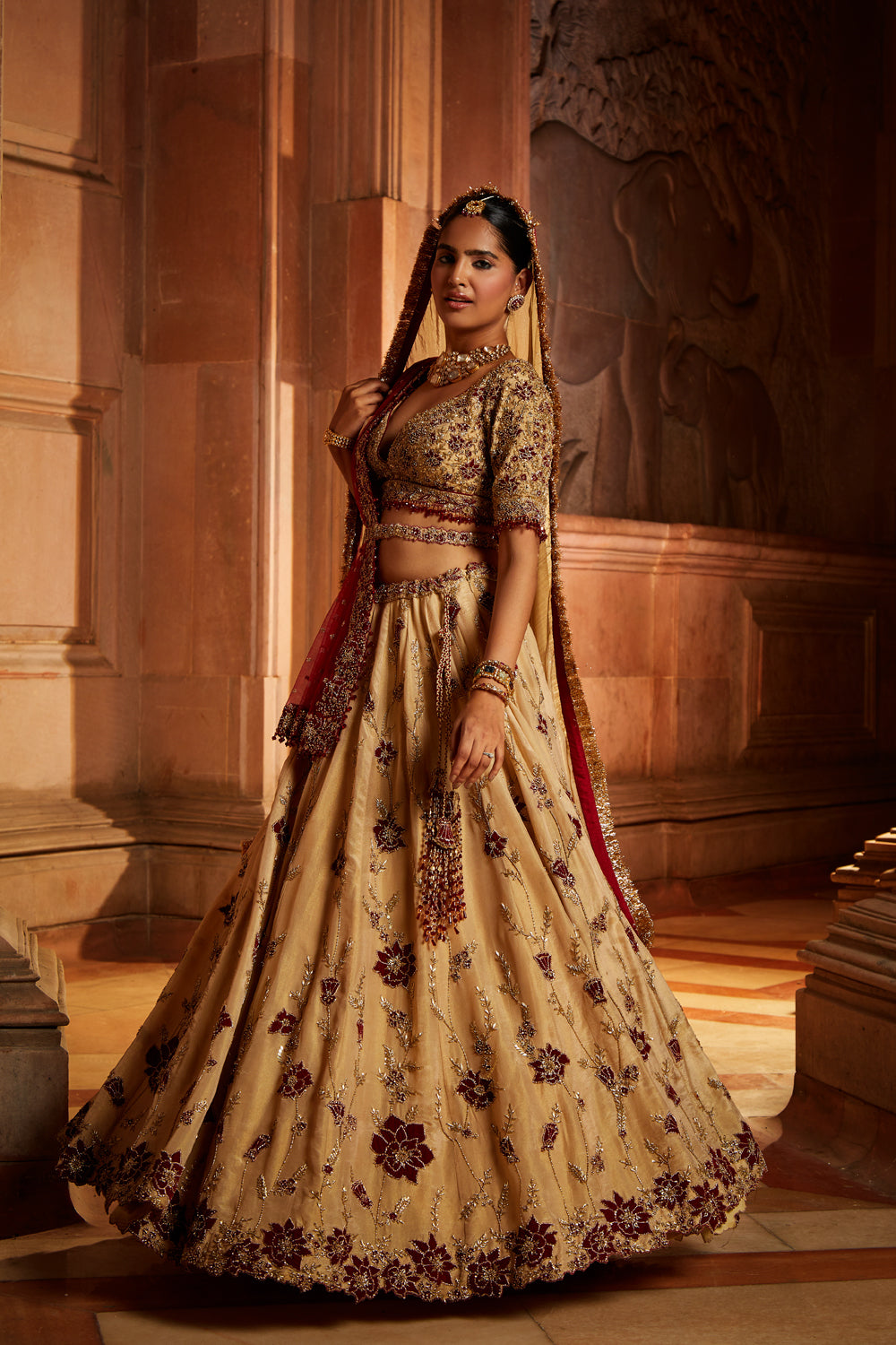 Gold Tissue Lehenga Choli and Belt with contrasting Red Tulle Dupatta and Optional Gold Tissue Second Dupatta