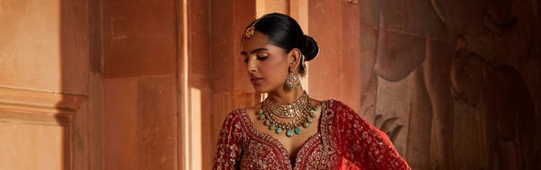 The Royal Flame: Unveiling the Charm of Red Bridal Lehengas by Nitika Gujral