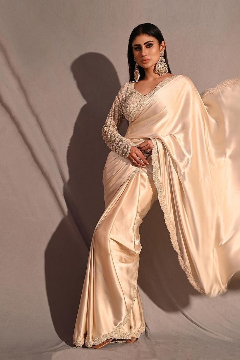 Mouni Roy IN Cream Satin Saree