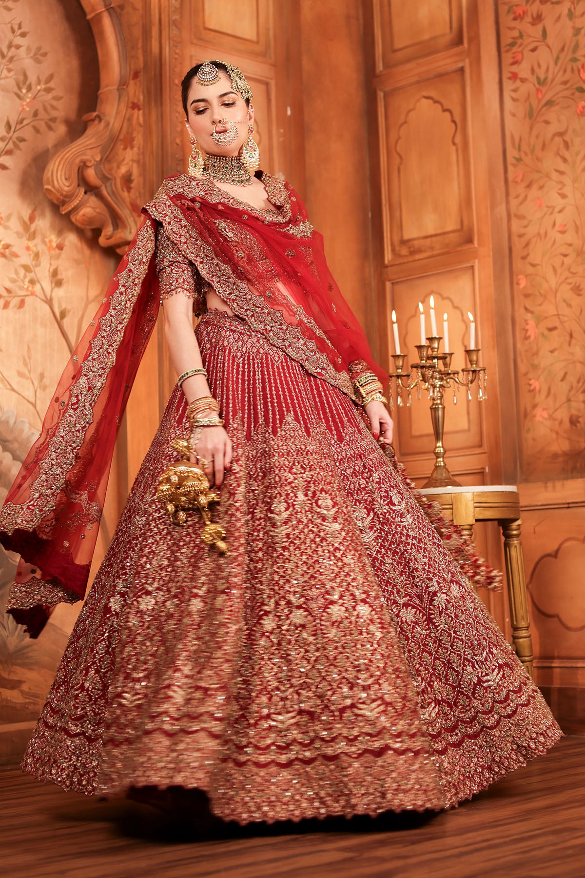 Jannat Khan In Blood Red Raw Silk Lehenga Choli and Belt with Tulle Dupatta with an Optional Lighter Second Dupatta