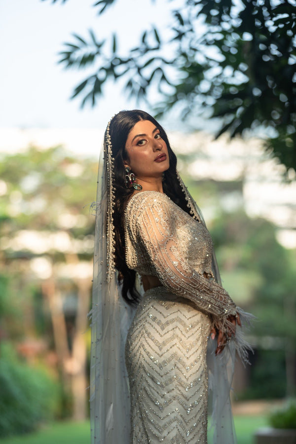 Trishala In Ivory Skirt With Blouse And Veil