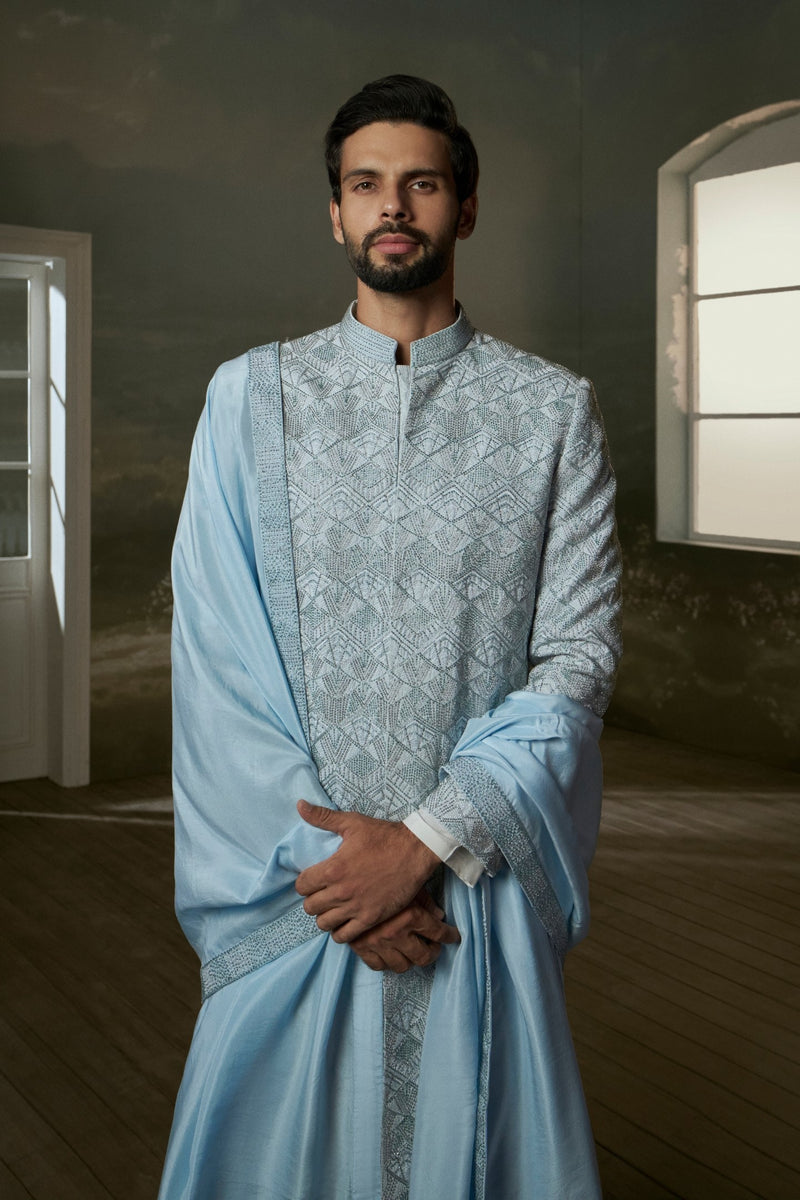 White kurta And pants with powder-blue embroidered raw silk sherwani and optional silk stole