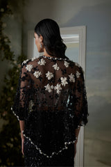 Black skirt and jacket set with an ivory corset