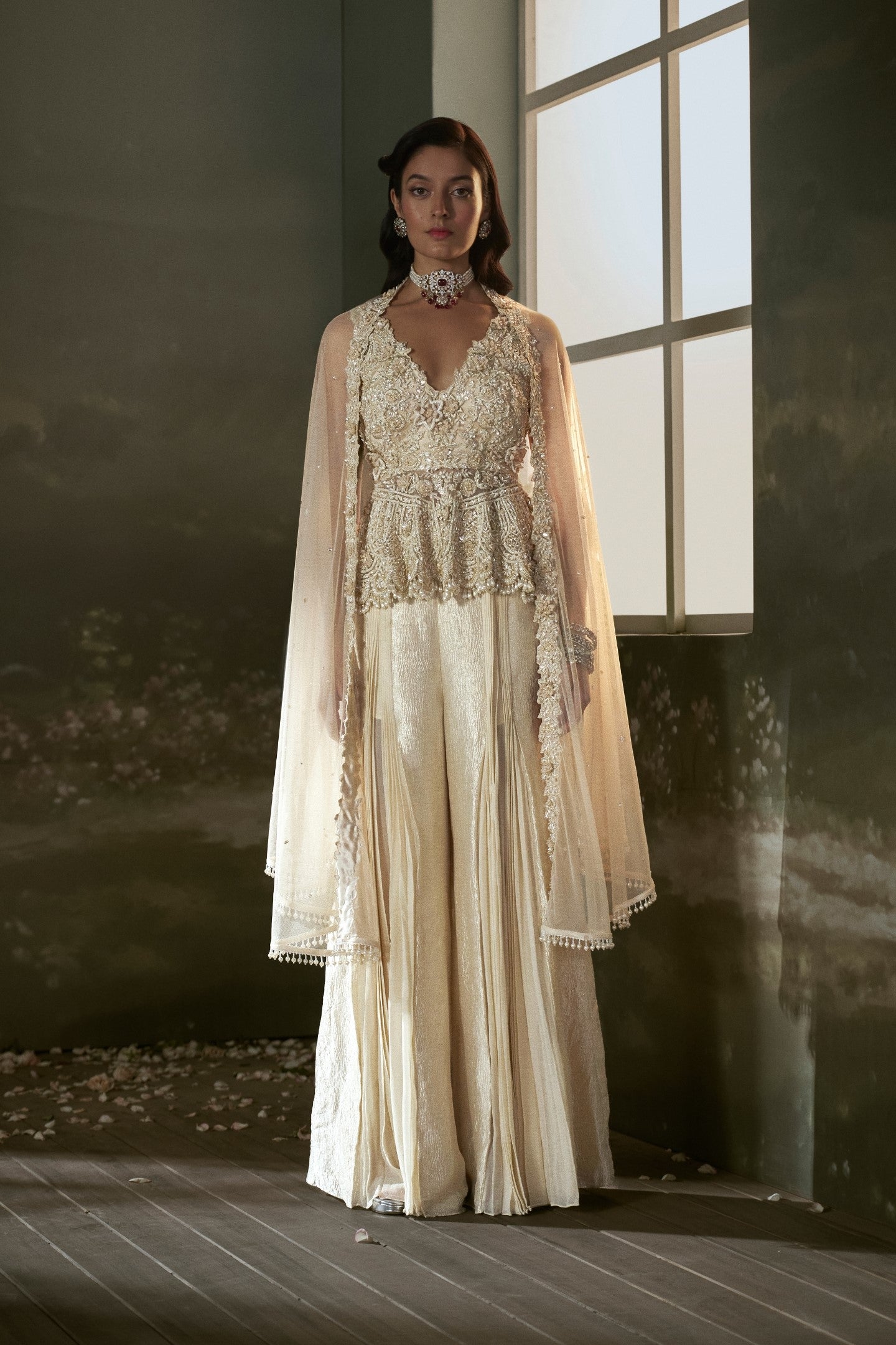 Deeksha Khurana In Cream peplum top and sharara set