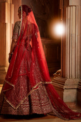 Jannat Khan In Blood Red Raw Silk Lehenga Choli and Belt with Tulle Dupatta with an Optional Lighter Second Dupatta