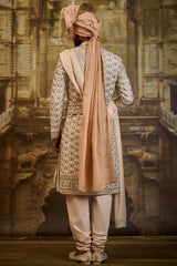 IVORY TAFFETA SILK SHERWANI BEIGE FRENCH KNOTS AND ZARDOZI WORK