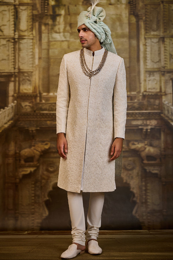 IVORY SELF EMBROIDERED SHERWANI SET