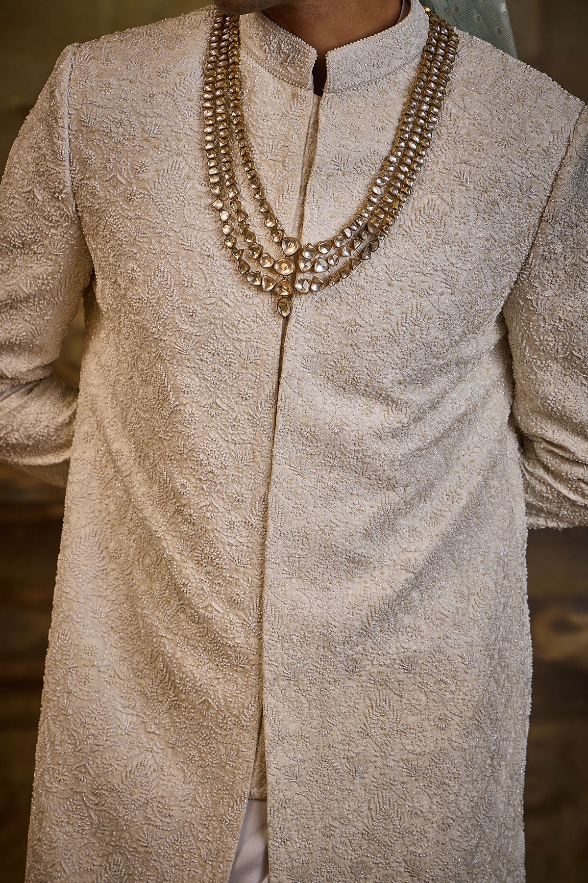 IVORY SELF EMBROIDERED SHERWANI SET