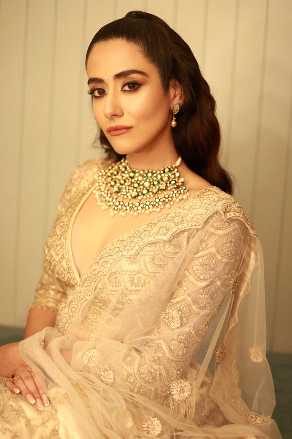 Jonita Gandhi In Light Beige Net Lehenga Choli Set