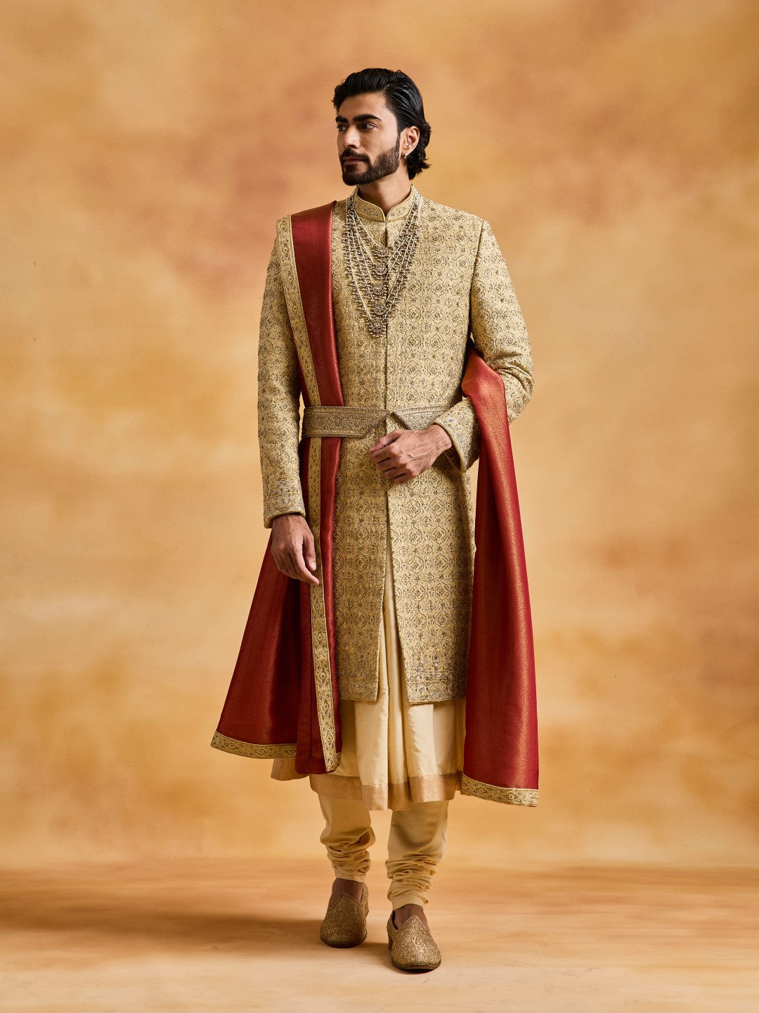 GOLD RAW SILK SHERWANI WITH CHOGA AND CHURIDAR