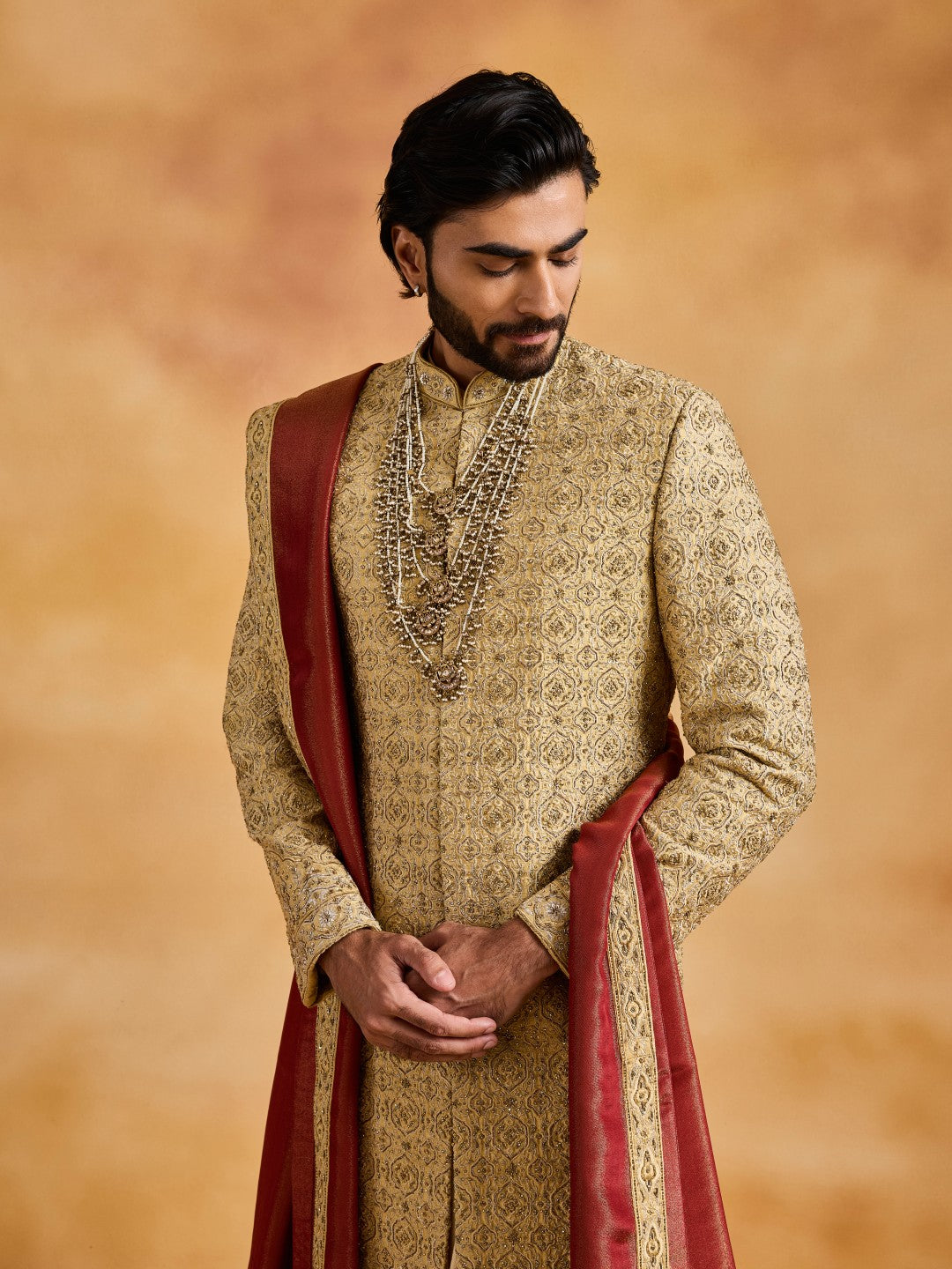 GOLD RAW SILK SHERWANI WITH CHOGA AND CHURIDAR