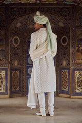 IVORY RAW SILK SHERWANI WITH KURTA AND CHURIDAR