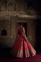 RED TO CORAL OMBRE DYED RAW SILK LEHENGA WITH A CORAL CHOLI AND RED DUPATTA