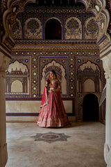 RED RAW SILK LEHENGA CHOLI WITH A NET DUPATTA