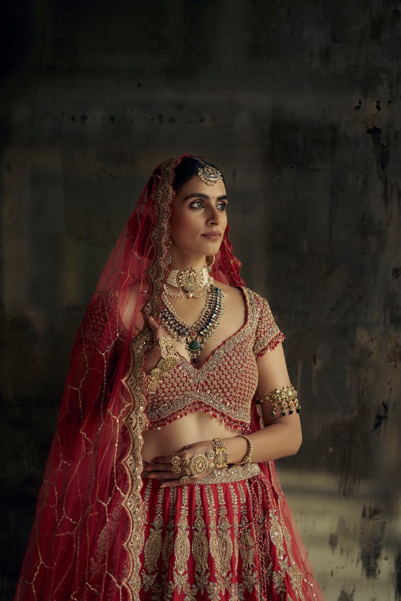 RED RAW SILK LEHENGA CHOLI SET WITH A HEAVY NET DUPATTA