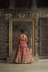 RED RAW SILK LEHENGA CHOLI SET WITH A HEAVY NET DUPATTA