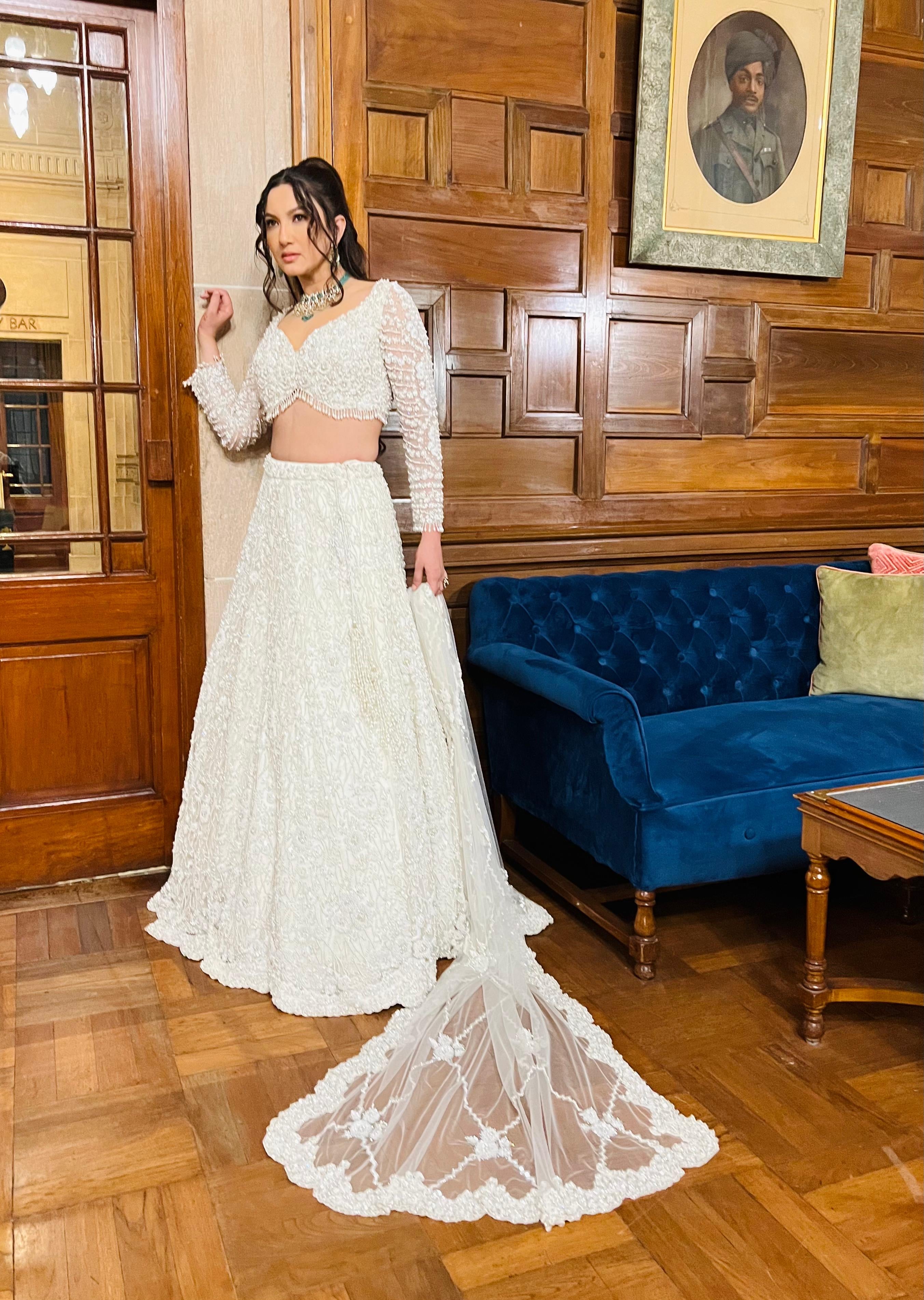 Gauhar Khan IN OFF WHITE NET LEHENGA CHOLI SET