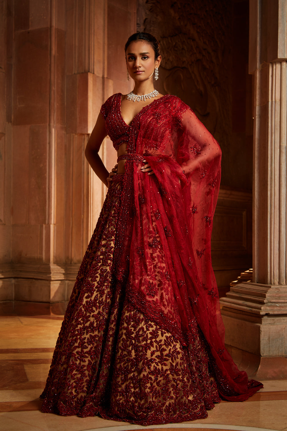 Nude Tulle Lehenga Choli with worked Belt and contrasting Organza Dupatta with an Optional Tulle Veil