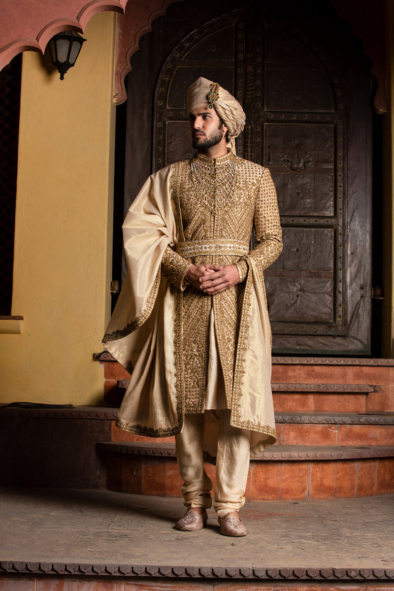 Gold Raw Silk Antique Embroidered Achkan with Belt and Kurta Churidar